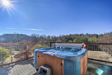 Enjoy stunning vistas from your private deck with a relaxing hot tub!