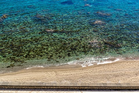 On the beach, sun loungers