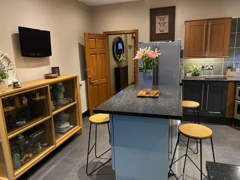 Kitchen with island/breakfast area. 