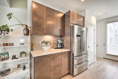 kitchen with coffee maker. Coffee included