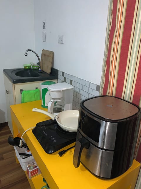 Fridge, microwave, coffee/tea maker, electric kettle