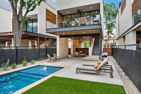 Schleyer Haus at Camp Warnecke-Heated pool with outdoor seating and Comal River views