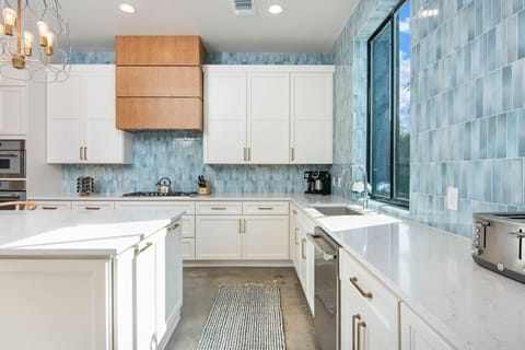 Spacious kitchen with island bar seating