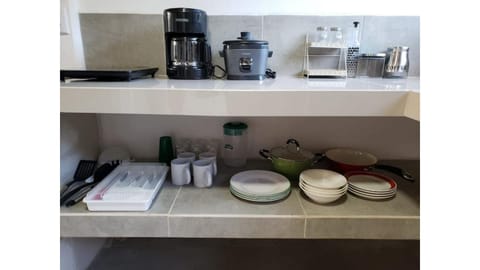 Microwave, coffee/tea maker, spices, paper towels