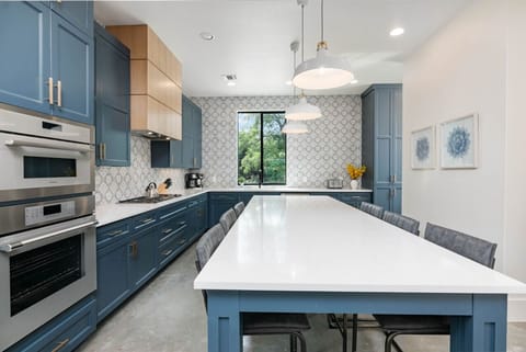 Spacious kitchen with bar seating