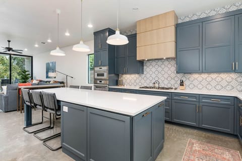 Spacious kitchen with bar seating