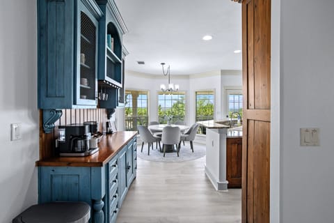 Seating for five or six in upholstered chairs with sunrise views.