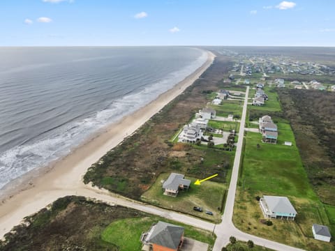 Long wide beach just outside the house, endless views. House is on 0.7 acre land