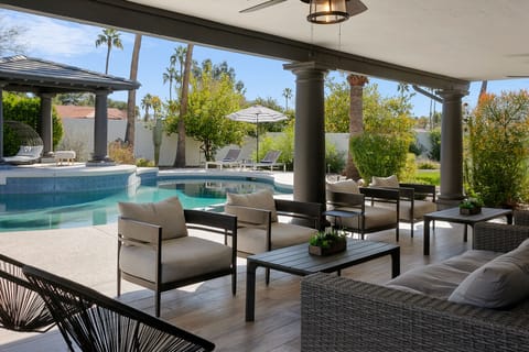 A heated pool, sun loungers