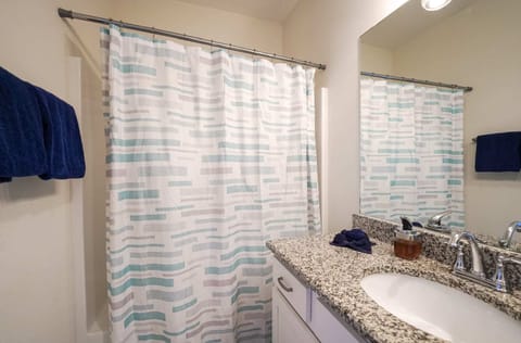 Bathtub, hair dryer, towels