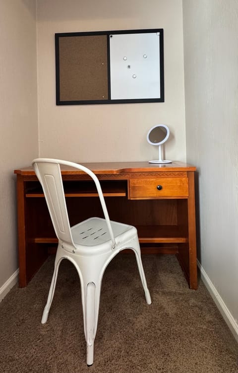 Desk, chair and makeup mirror in bedroom #3