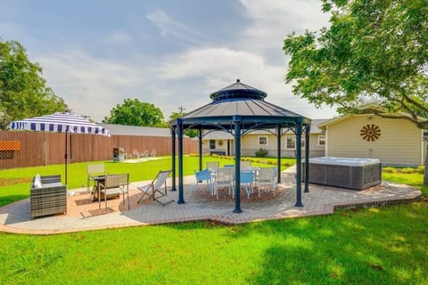 Huge backyard entertainment paradise! There are lights under the gazebo and around the pathways & a few flood lights in the back yard. WIFI reaches to the gazebo outdoor workspace, desk, outdoor office space.