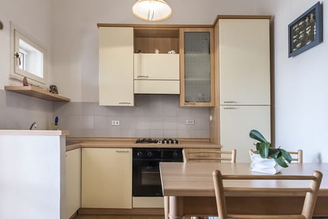 Fridge, oven, dining tables