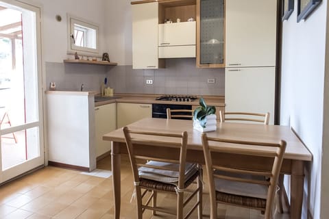 Fridge, oven, dining tables