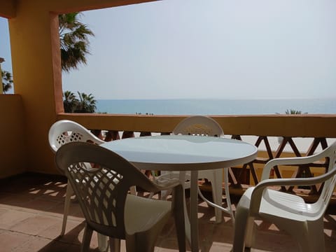 Terrace. Front line beach. Doña Lola. Calahonda