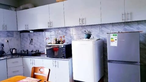 Fridge, microwave, electric kettle, toaster