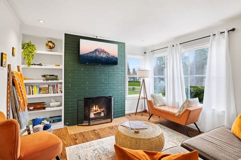 Step into our inviting main floor living room. This cozy and welcoming space is perfect for gathering with loved ones or enjoying a quiet moment of relaxation.