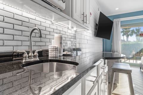 Kitchenette area with full size refrigerator