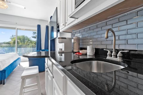 Kitchenette with microwave and full size refrigerator