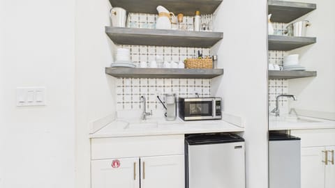 Kitchenette with microwave and under counter refrigerator