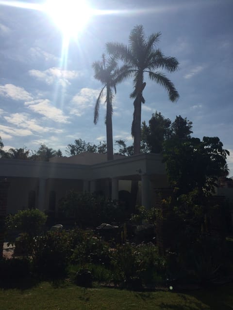 A view to the grand house from your backyard