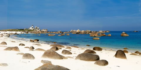 On the beach, sun loungers