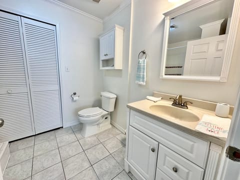 Combined shower/tub, hair dryer, towels, toilet paper