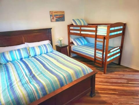 2nd bedroom with King size bed and bunk bed. Sleeps 4 people easily