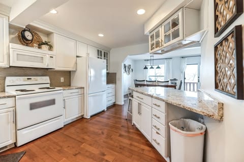 Recently renovated spacious kitchen with island on the main level.
