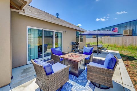 Back patio with dining area, propane bbq and gas firepit. The landscaping is now done!