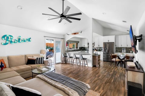 Welcome to our open concept space, seamlessly connecting the kitchen, living room, and dining area, creating a harmonious flow for easy entertaining and socializing.