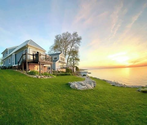Backyard view with a sunset over Lake Erie