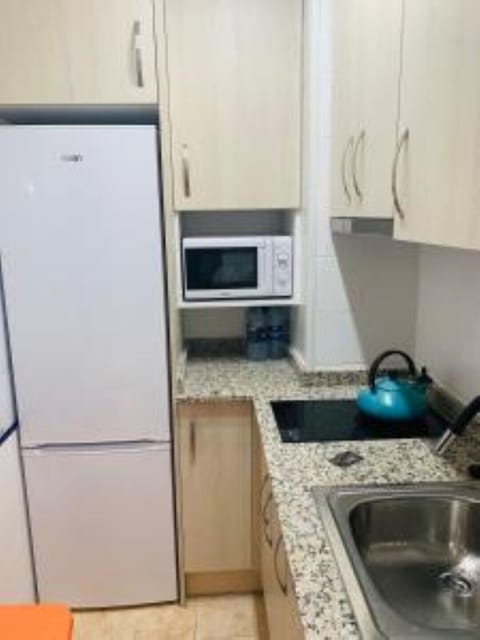 Fridge, microwave, coffee/tea maker, electric kettle