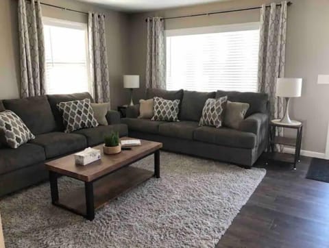 Living room has two full size couches