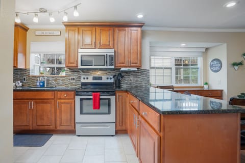 Get inspired to cook and entertain in the stylish and fully equipped kitchen, complete with all the modern amenities you need to whip up a delicious meal