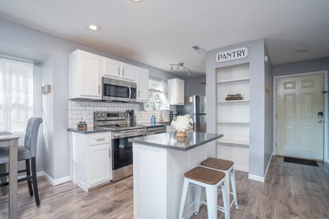 Whip up a delicious meal in the fully equipped kitchen - the heart of your cozy condo that's sure to inspire your inner chef!