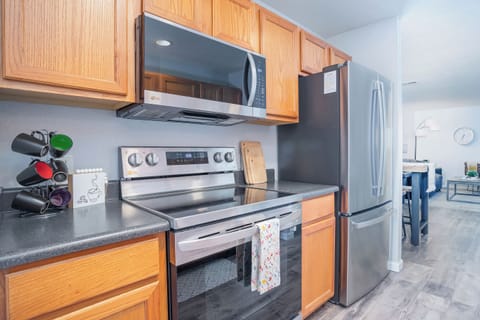 Get inspired to cook and entertain in the stylish and fully equipped kitchen, complete with all the modern amenities you need to whip up a delicious meal.