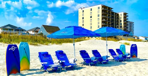 On the beach, sun loungers, beach towels