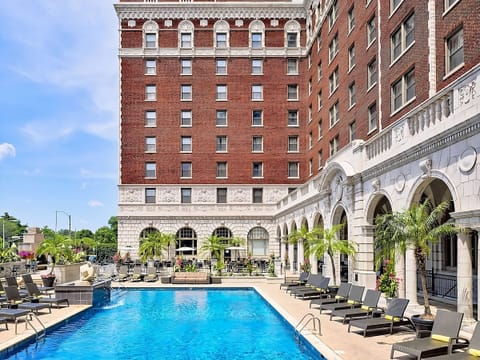 A heated pool, sun loungers