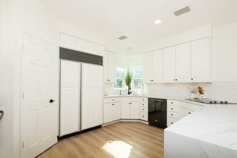 Large kitchen with sub zero refrigerator