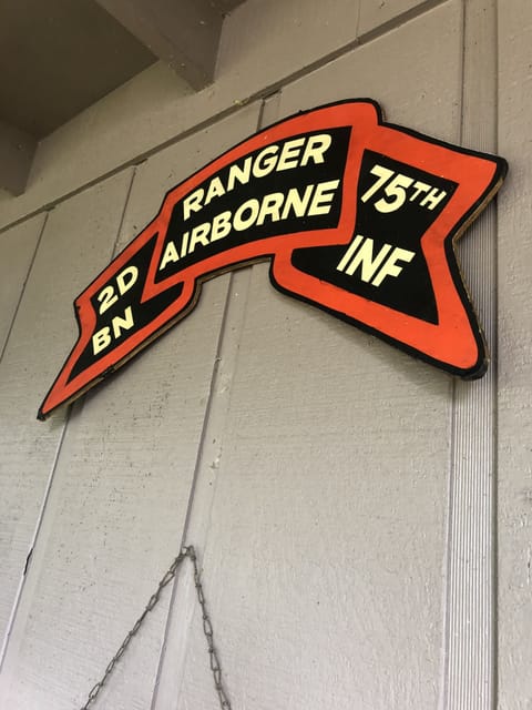 Sign, Emblem, Wall, Shelter, Shop