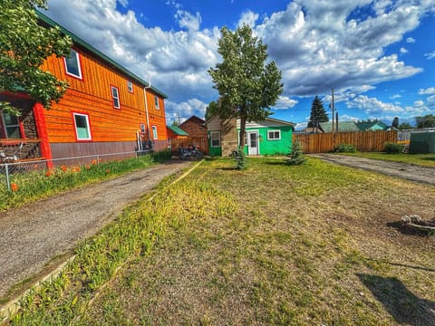 Front of house with two driveways