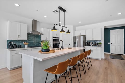 Bar seating at our enormous kitchen island.