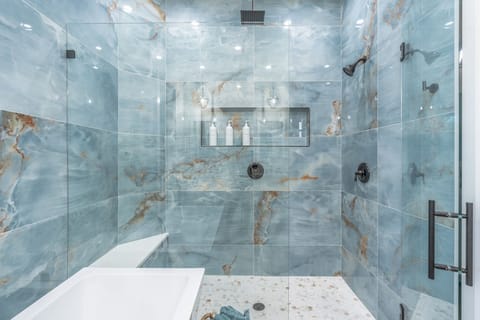 Combined shower/tub, hair dryer, towels, soap