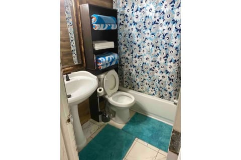 Combined shower/tub, hair dryer, towels, soap