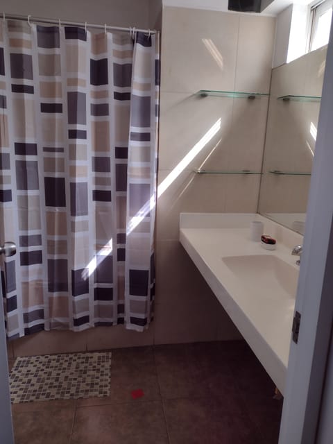 Combined shower/tub, hair dryer, towels, soap