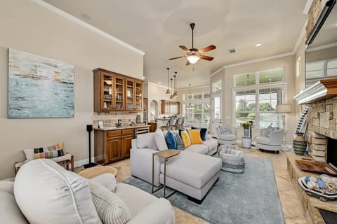 Open living/dining room with a view and bar.