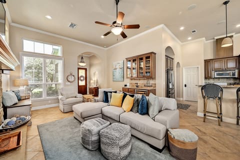 Don't miss out on any of the fun with this open living room/kitchen. 