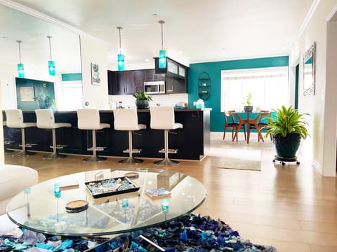  View from sofa of open concept kitchen/ living room