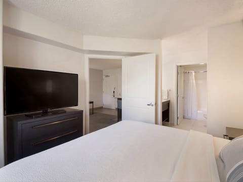 Kick back in bed and enjoy a big-screen movie night.